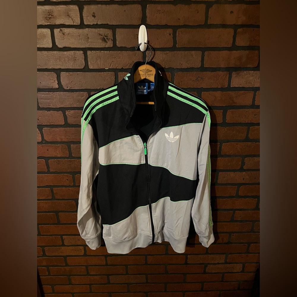 Adidas Large Men's Black and Gray Windbreaker with Green Stripes.